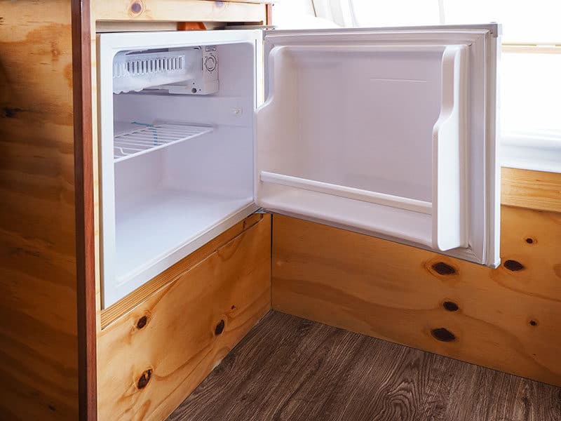 White Compact Refrigerator Opened