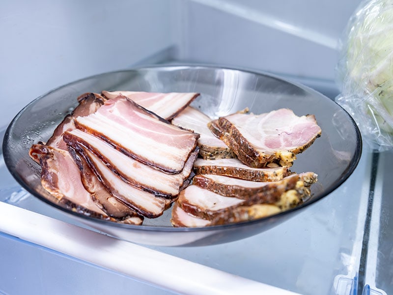 how long can cooked turkey bacon be left out