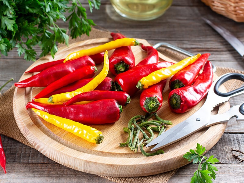 Chili Pepper on Wooden Board