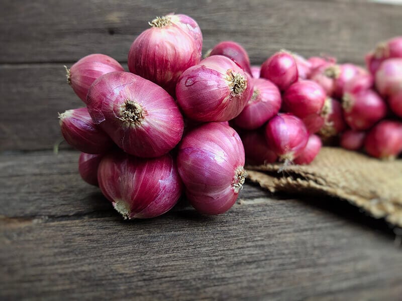 Shallots on Wooden Table