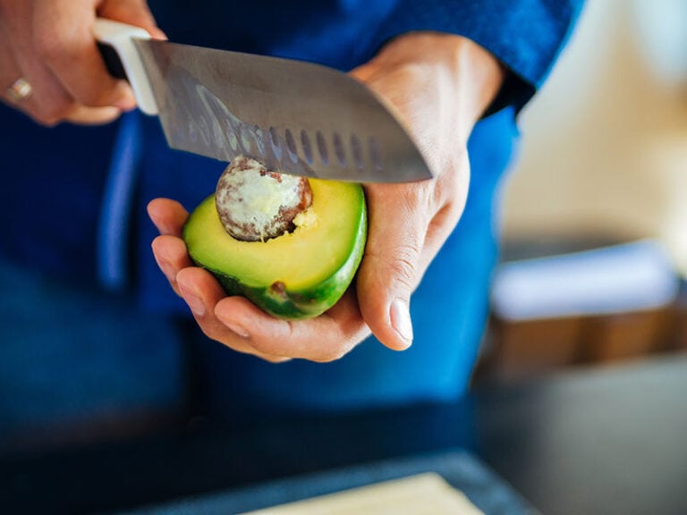 Fresh Avocado Being Cut