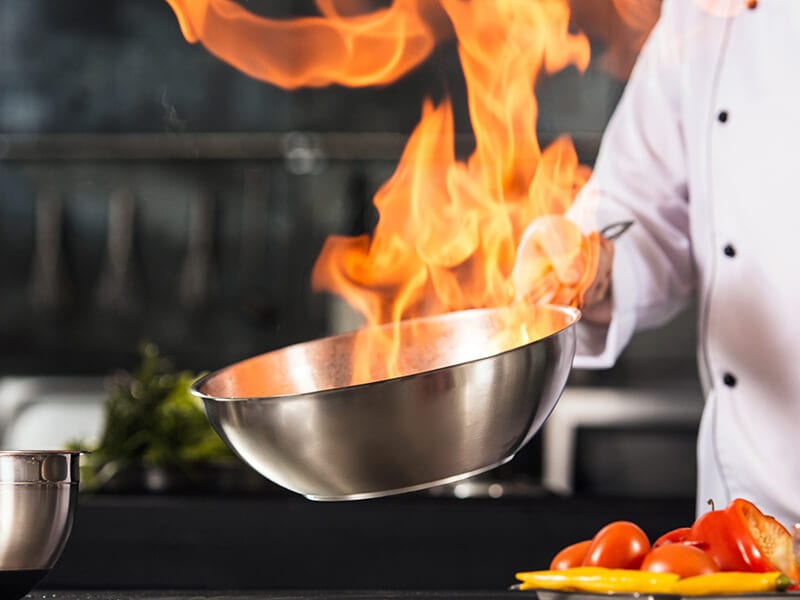 Chef Hands Hold Wok