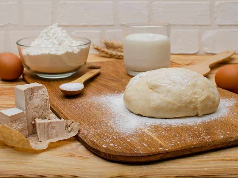 Fresh Yeast With Flour On Board