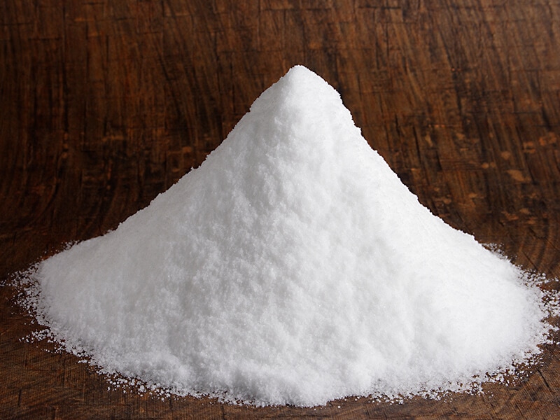 Iodized Salt On Dark Background