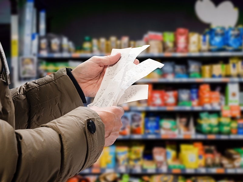 Man Viewing Receipts