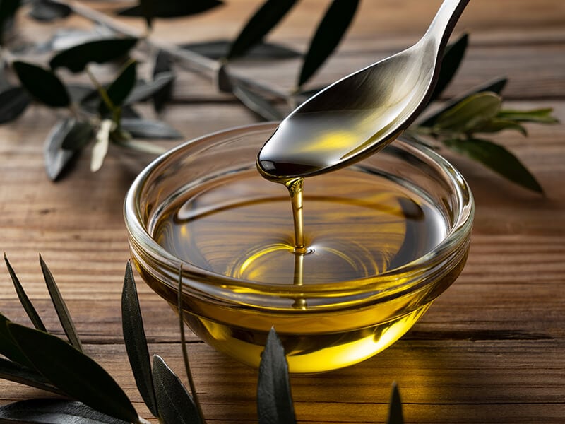 Olive Oil Into Bowl