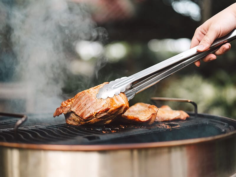 Tongs And Meat