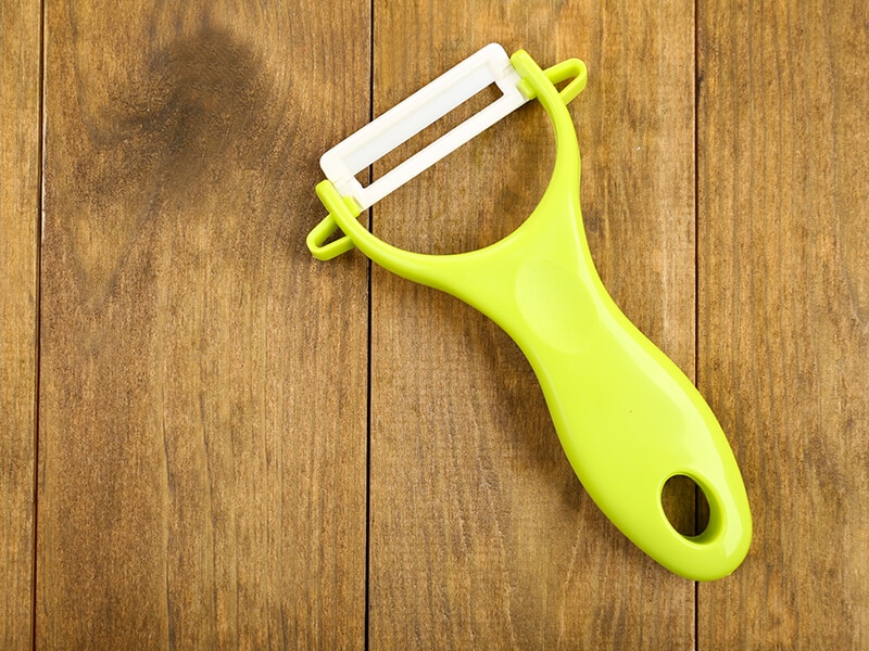 Vegetable Peeler On Table