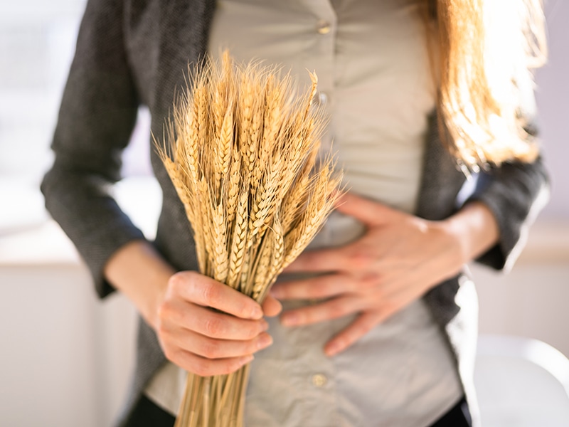 Women Holding Wheat