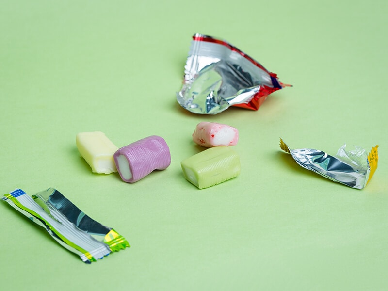 Chewy Candies Open Wrappers