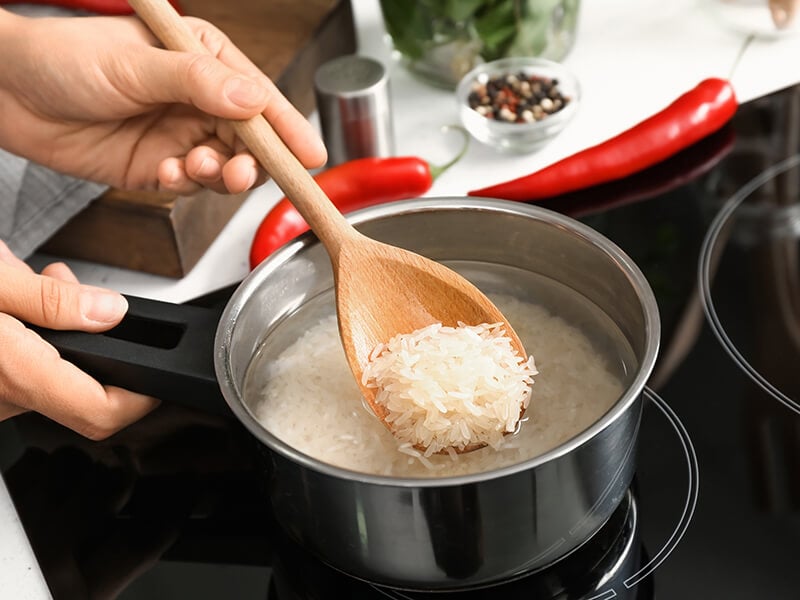 Cooking Rice On Saucepan