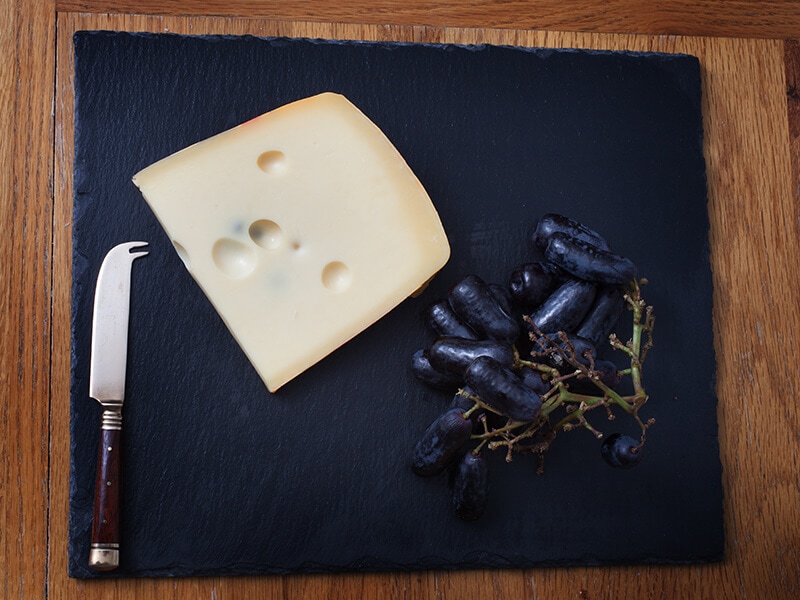 Jarlsberg Cheese With Black Grapes