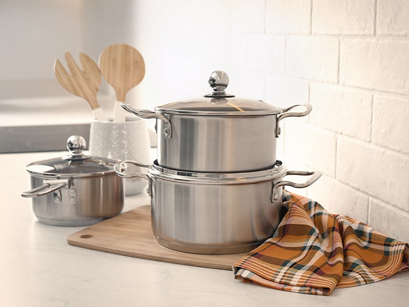 Stainless Steel Cookware On Kitchen